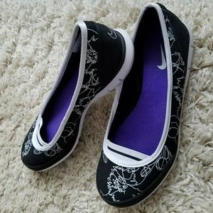 Nike casual slip on shoes. Black with white. NWOT